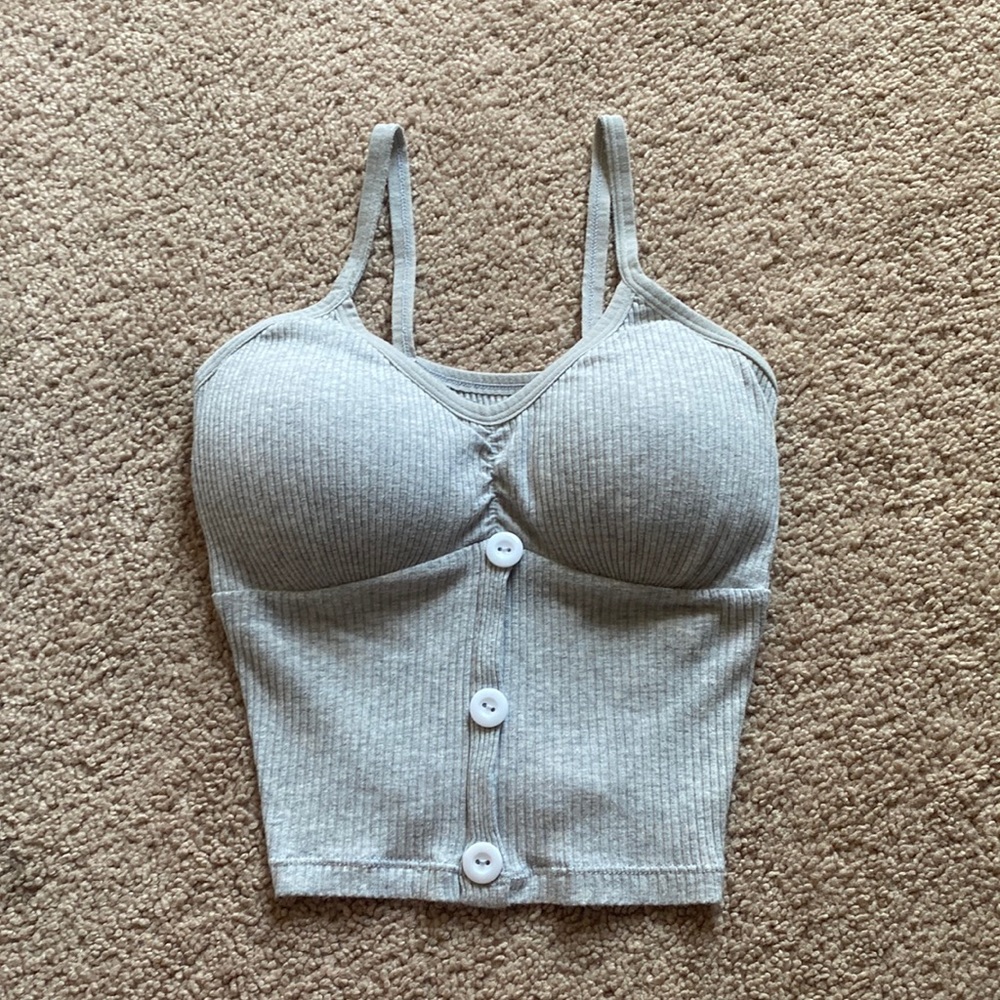 Cropped tank top with built in bra.
